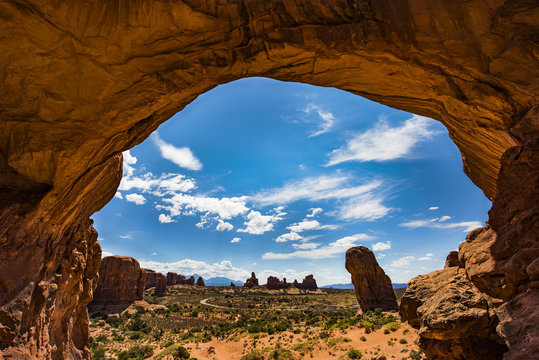 Fototapeta A valley view through Double Arch in Arches National Park, Utah.