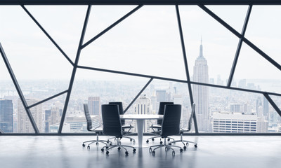 A meeting room in a bright contemporary panoramic office space with New York city view. The concept of highly professional financial or legal services. 3D rendering.