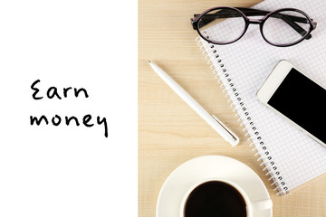 Top view of working place elements on wooden table