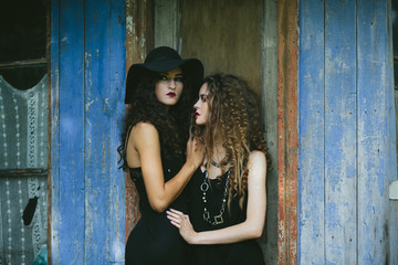 Fototapeta premium two vintage women as witches