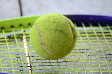 tennis ball on racket Shallow Dof.