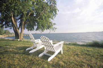 Two Adirondack chairs overlooking the Chesapeake Bay, MD - obrazy, fototapety, plakaty