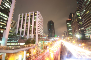 Fototapeta na wymiar Blurred night lights of the Bangkok