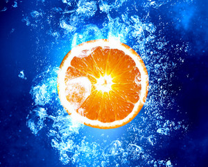 Juicy orange in water