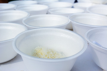 Brown rice in foam bowl pattern.
