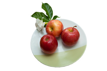 Apples and Jasmin flower on dish
