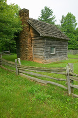Fototapeta na wymiar Historic log cabin on Blue Ridge Parkway near North Carolina and Virginia border