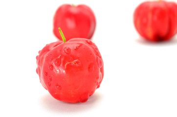 acerola fruit isolated on white