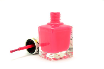 Pink nail polish on white background