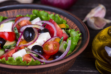 Fresh vegetable greek salad on the table