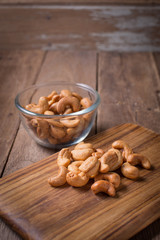cashew nuts on wooden background