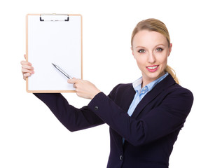 Young Businesswoman pen point to clipboard