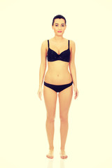 Obraz premium Beautiful woman standing in underwear.