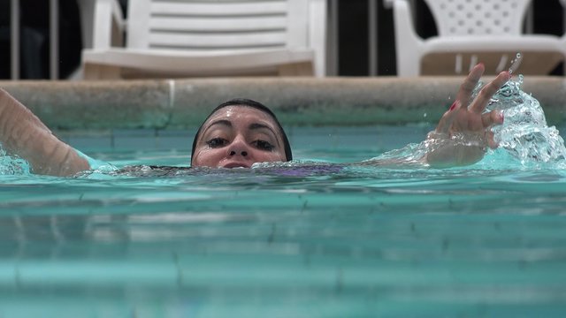 Woman Drowning in Swimming Pool