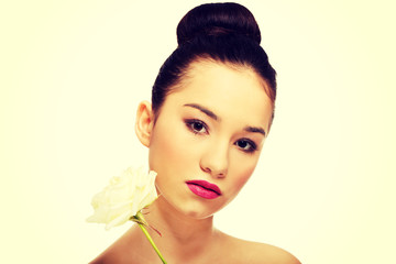 Naklejka premium Beautiful woman with white rose.