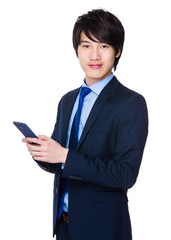 Young Businessman use of the cellphone