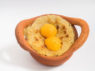 Thai Dessert (Khanom Wan Thai) name is coconut custard squares in brown pottery pots.Has golden threads on the top of dessert.