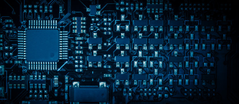 A close-up picture of the macrocosm dashboard, chipboard computer, black background including CPU, card, mainboard, small accessories, sir, cir..