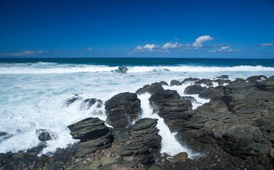 flying foam by the shore