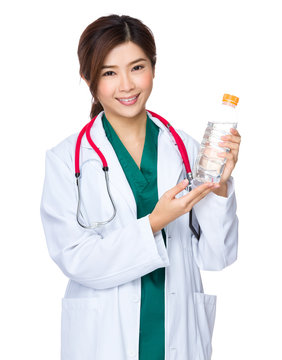 Doctor show with water bottle