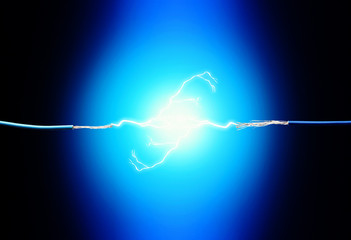 Electric cables with glowing electricity lightning, close up