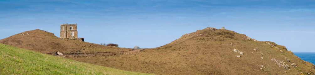 Panoramic view with Doyden Castle near Port Quin in north Cornwall.