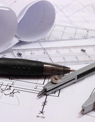 Rolls of electrical diagrams and accessories for drawing
