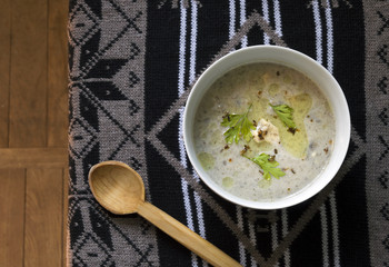 Chicken cream stew with wooden spoon