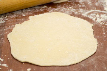 Fototapeta na wymiar dough pizza pin