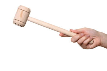 wood hammer for beating the meat in the hand of women isolated on white background