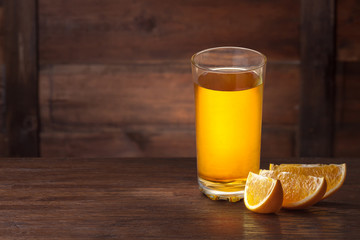 Orange slices on wood