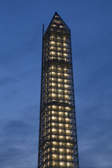 Washington Memorial at dusk with lights on, is covered in scaffolding as result of Earthquake, Washington, D.C., a US Icon.