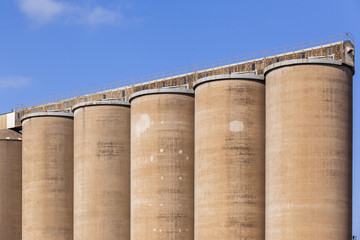 Grain Silos structures for maize wheat agriculture produce. © ChrisVanLennepPhoto