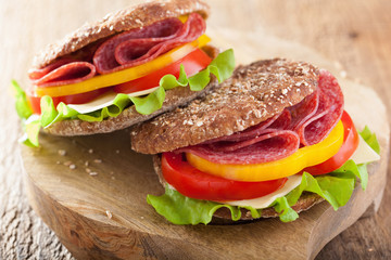 healthy salami sandwich with tomato pepper and lettuce