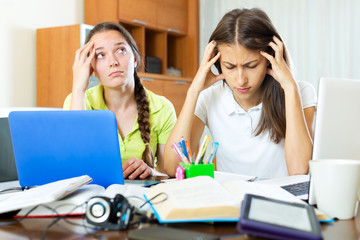 Two melancholy female students