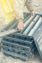 Core drill worker extracts core samples 2