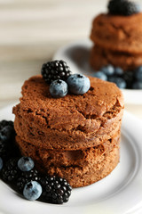 Cakes with berries on the table