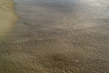 Sand covered with water on tropical beach