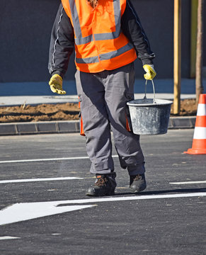 Worker at the road cosntruction