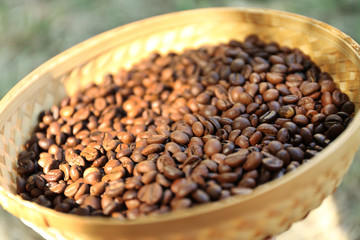 Roasted coffee beans in wattled basket