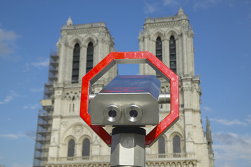 Binoculars pointed at Notre Dame Cathedral, Paris, France