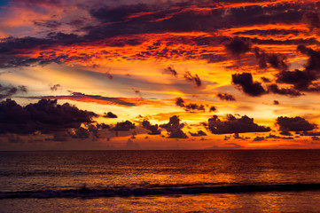 Colorful swirl clouds and sky after sunset. A beautiful red and