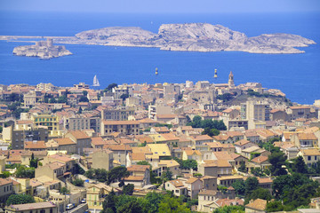 Fototapeta na wymiar Aerial view of one of the Frioul islands, the Chateau d'If and the town of Marseilles, France