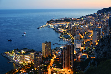 View of the city of Monaco by night. French Riviera