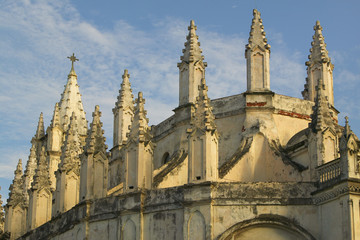 Fototapeta na wymiar Very old Cuban church in Havana with cross on top