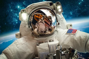 Fotobehang Astronaut in de ruimte © Andrei Armiagov