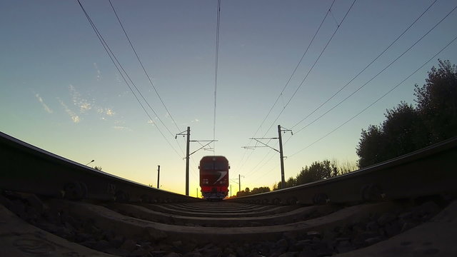 Train, view from below. Sunset