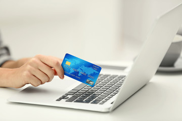 Female making online payment, close up
