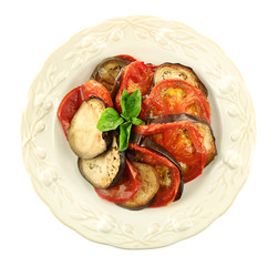 Ratatouille on plate, isolated on white