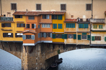 Fototapeta na wymiar View of Gold (Ponte Vecchio) Bridge in Florence. Close up balcon